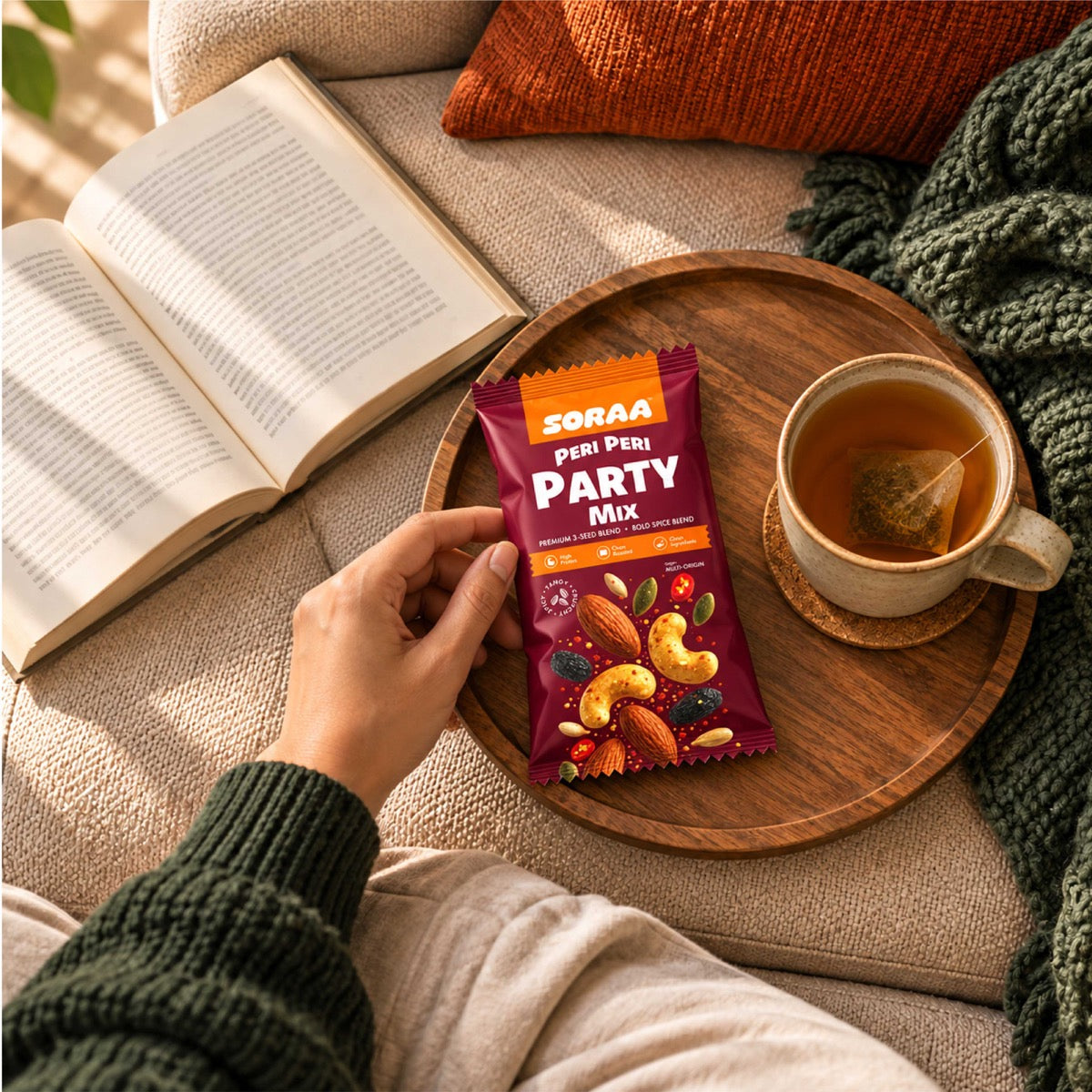 SORAA Peri Peri Party Mix with a book and tea